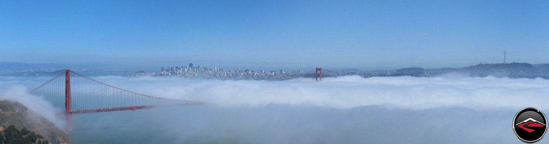 Scenic Panorama of San Francisco and the Golden Gate Bridge, only the top of the bridge can be seen above the fog