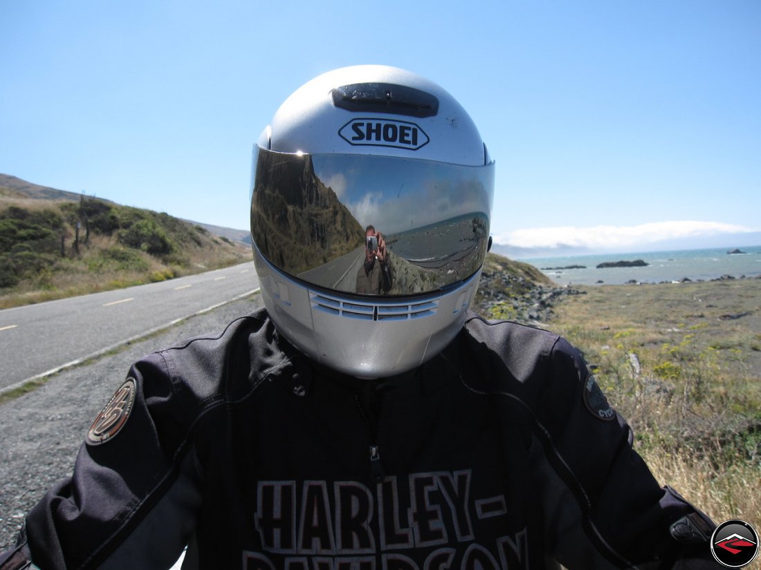 Dave reflected in the mirrored visor of Toms Shoei helmet; meta photo