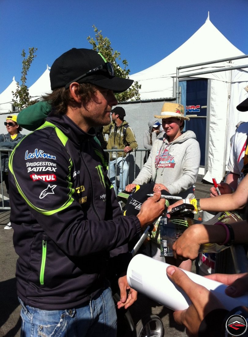 2012 Yamaha Tech 3 Rider, Cal Crutchlow, signing autographs at Laguna Seca raceway