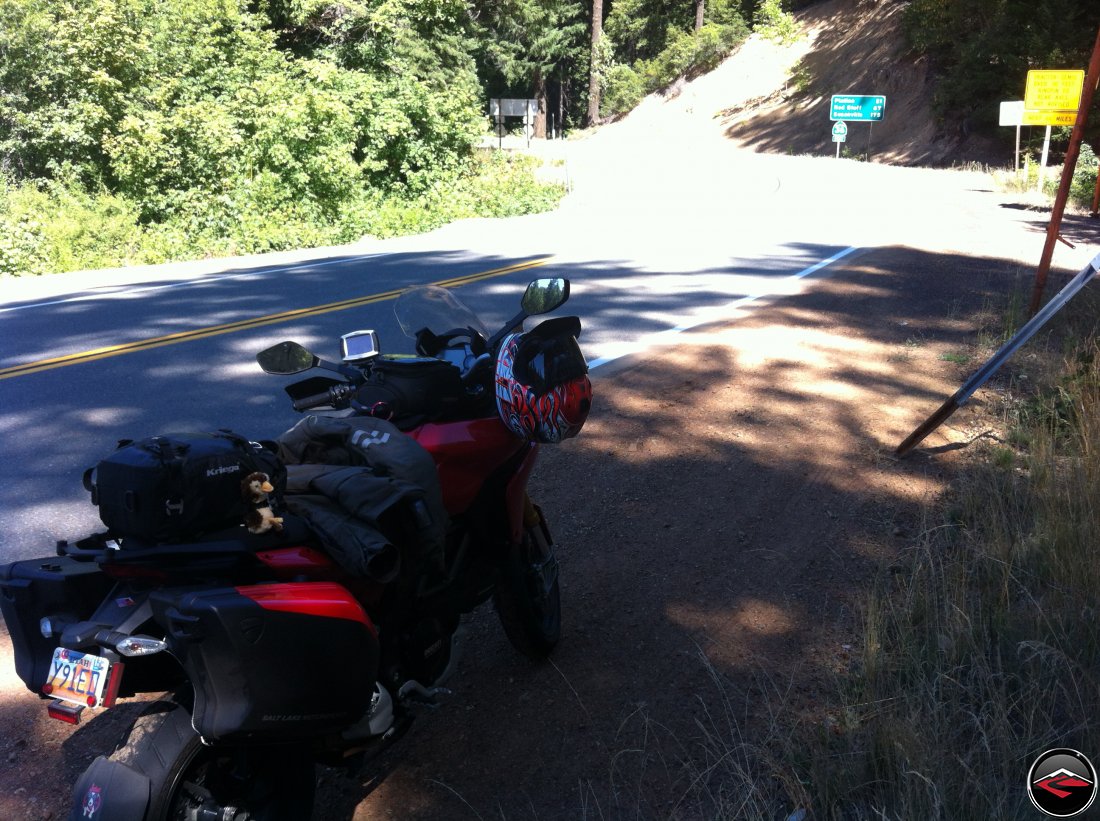 A Ducati Multistrada 1200 parked on the side of the road along California Highway 36, Bramlot Road, at the intersection with California Highway 3
